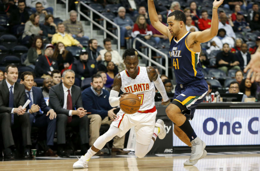 Feb 6, 2017; Atlanta, GA, USA; Atlanta Hawks guard Dennis Schroder (17) drives past Utah Jazz forward Trey Lyles (41) in the first quarter at Philips Arena. Mandatory Credit: Brett Davis-USA TODAY Sports
