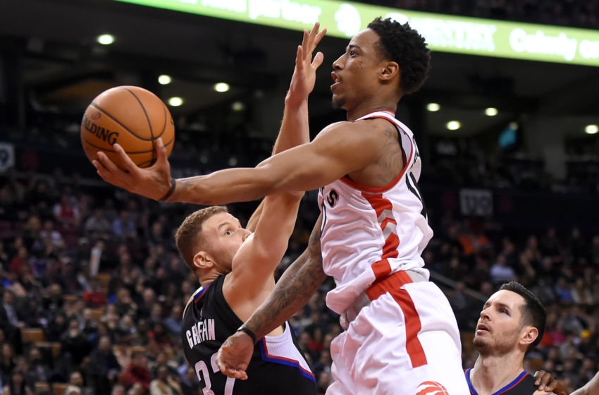 Feb 6, 2017; Toronto, Ontario, CAN; Toronto Raptors guard DeMar DeRozan (10) shoots the ball past Los Angeles Clippers forward Blake Griffin (32) in the fourth quarter at Air Canada Centre. Mandatory Credit: Dan Hamilton-USA TODAY Sports