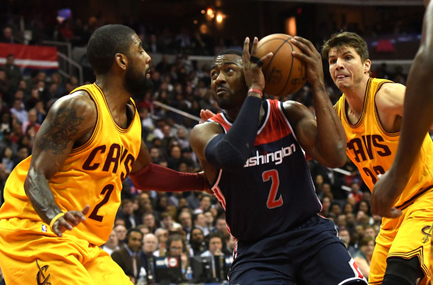 Feb 6, 2017; Washington, DC, USA; Washington Wizards guard John Wall (2) makes a move to the basket asCleveland Cavaliers guard Kyrie Irving (2) defends during the third quarter at Verizon Center. Cleveland Cavaliers defeated Washington Wizards 140-135 in third quarter. Mandatory Credit: Tommy Gilligan-USA TODAY Sports