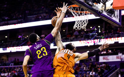 Feb 6, 2017; New Orleans, LA, USA; New Orleans Pelicans forward Anthony Davis (23) blocks a shot by Phoenix Suns center Tyson Chandler (4) during the second half at the Smoothie King Center. The Pelicans won 111-106. Mandatory Credit: Derick E. Hingle-USA TODAY Sports