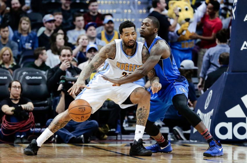 Feb 6, 2017; Denver, CO, USA; Denver Nuggets forward Wilson Chandler (21) looks to pass the ball as Dallas Mavericks forward Dorian Finney-Smith (10) defends in the third quarter at the Pepsi Center. The Nuggets won 110-87. Mandatory Credit: Isaiah J. Downing-USA TODAY Sports