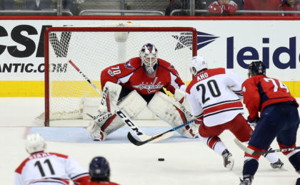 Feb 7, 2017; Washington, DC, USA; Washington Capitals goalie Braden Holtby (70) prepares to make a save on Carolina Hurricanes left wing Sebastian Aho (20) in the second period at Verizon Center. Mandatory Credit: Geoff Burke-USA TODAY Sports