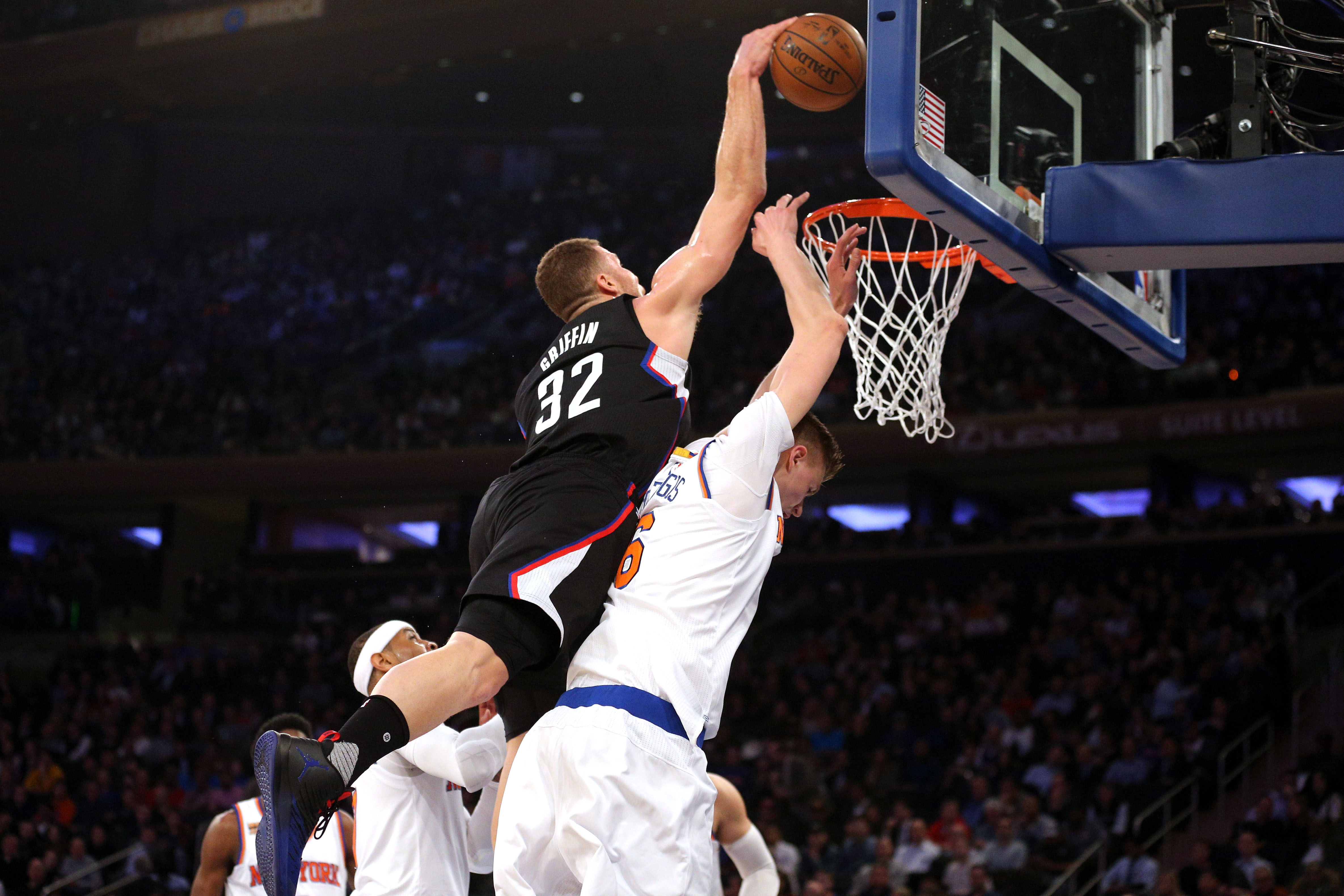 Blake Griffin adds another player to his poster with dunk on Miles Plumlee