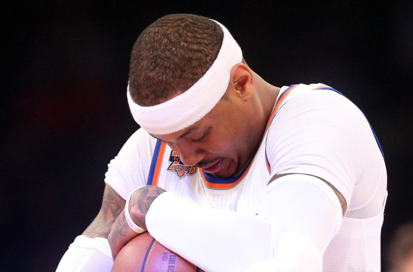 Feb 8, 2017; New York, NY, USA; New York Knicks small forward Carmelo Anthony (7) inspects the basketball before a game against the Los Angeles Clippers at Madison Square Garden. Mandatory Credit: Brad Penner-USA TODAY Sports
