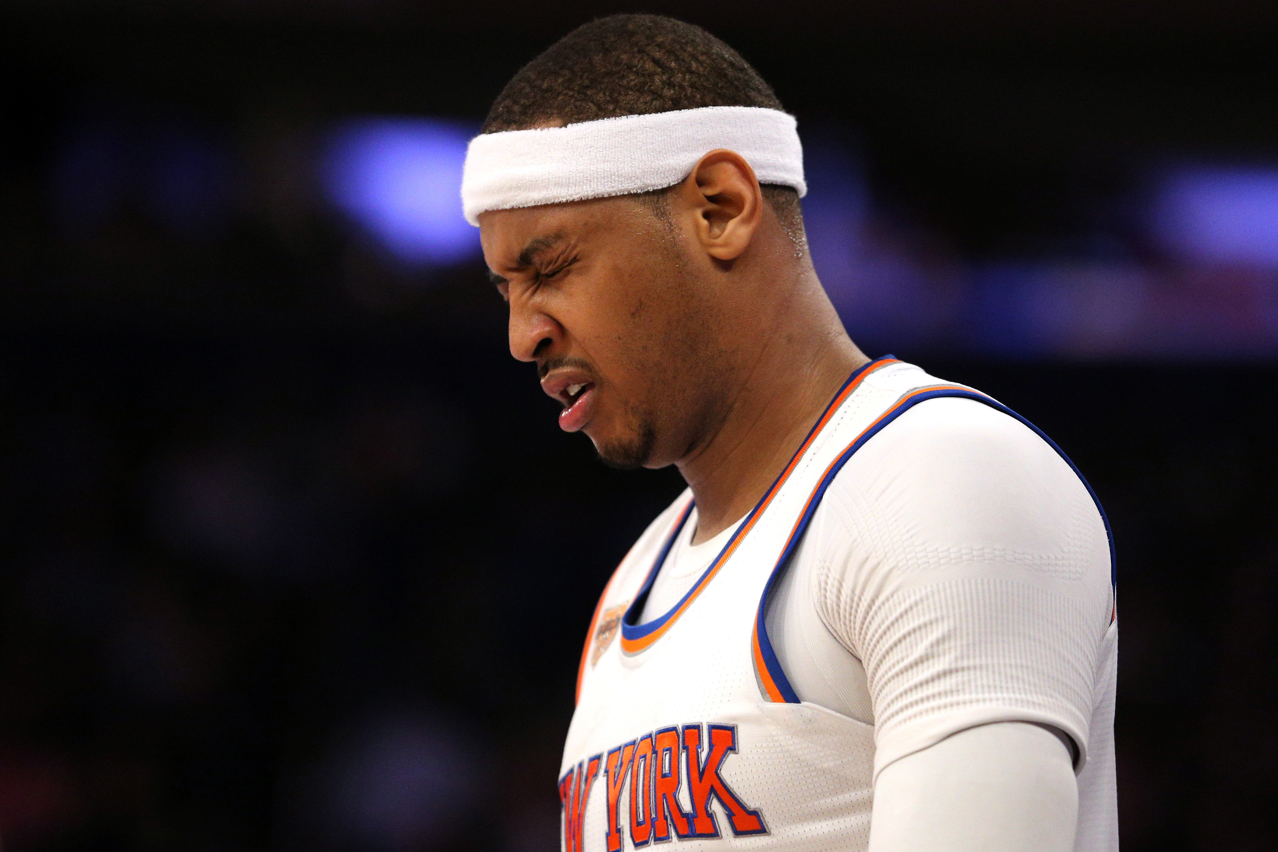 Feb 8, 2017; New York, NY, USA; New York Knicks small forward Carmelo Anthony (7) winces during the third quarter against the Los Angeles Clippers at Madison Square Garden. Mandatory Credit: Brad Penner-USA TODAY Sports