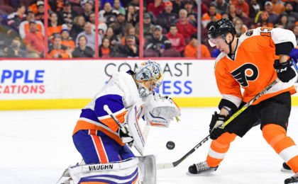 Feb 9, 2017; Philadelphia, PA, USA; New York Islanders goalie Thomas Greiss (1) makes a save as Philadelphia Flyers left wing Roman Lyubimov (13) looks for the rebound during the second period at Wells Fargo Center. Mandatory Credit: Eric Hartline-USA TODAY Sports