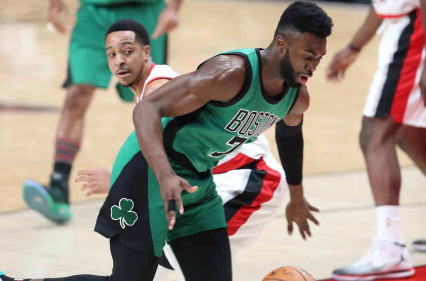 Feb 9, 2017; Portland, OR, USA; Boston Celtics forward Jaylen Brown (7) spins around Portland Trail Blazers guard C.J. McCollum (3) in the first half at Moda Center. Mandatory Credit: Jaime Valdez-USA TODAY Sports