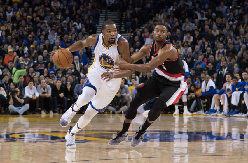 January 4, 2017; Oakland, CA, USA; Golden State Warriors forward Kevin Durant (35) dribbles the basketball against Portland Trail Blazers forward Maurice Harkless (4) during the third quarter at Oracle Arena. The Warriors defeated the Trail Blazers 125-117. Mandatory Credit: Kyle Terada-USA TODAY Sports