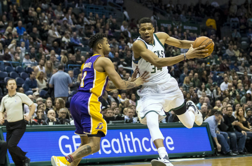 Feb 10, 2017; Milwaukee, WI, USA; Milwaukee Bucks forward Giannis Antetokounmpo (34) drives for the basket as Los Angeles Lakers guard D'Angelo Russell (1) defends during the third quarter at BMO Harris Bradley Center. Mandatory Credit: Jeff Hanisch-USA TODAY Sports