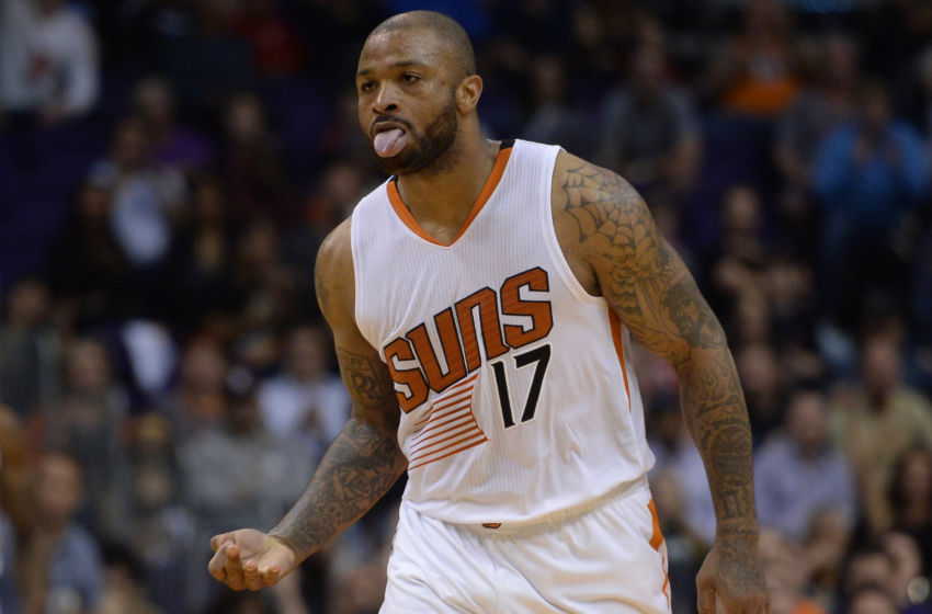 Feb 10, 2017; Phoenix, AZ, USA; Phoenix Suns forward P.J. Tucker (17) reacts after making a three point basket against the Chicago Bulls during the second half at Talking Stick Resort Arena. The Suns won 115-97. Mandatory Credit: Joe Camporeale-USA TODAY Sports