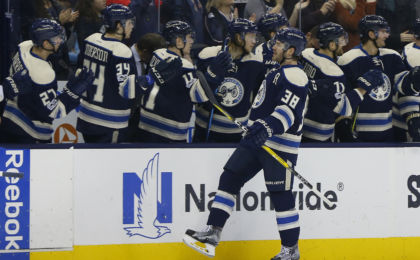 Feb 11, 2017; Columbus, OH, USA; Columbus Blue Jackets center Boone Jenner (38) celebrates with teammates on the bench after scoring a goal against the Detroit Red Wings during the first period at Nationwide Arena. Mandatory Credit: Russell LaBounty-USA TODAY Sports