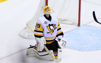 Feb 11, 2017; Glendale, AZ, USA; Pittsburgh Penguins goalie Marc-Andre Fleury (29) reacts after giving up a goal to Arizona Coyotes defenseman Connor Murphy (5) during overtime at Gila River Arena. Mandatory Credit: Matt Kartozian-USA TODAY Sports