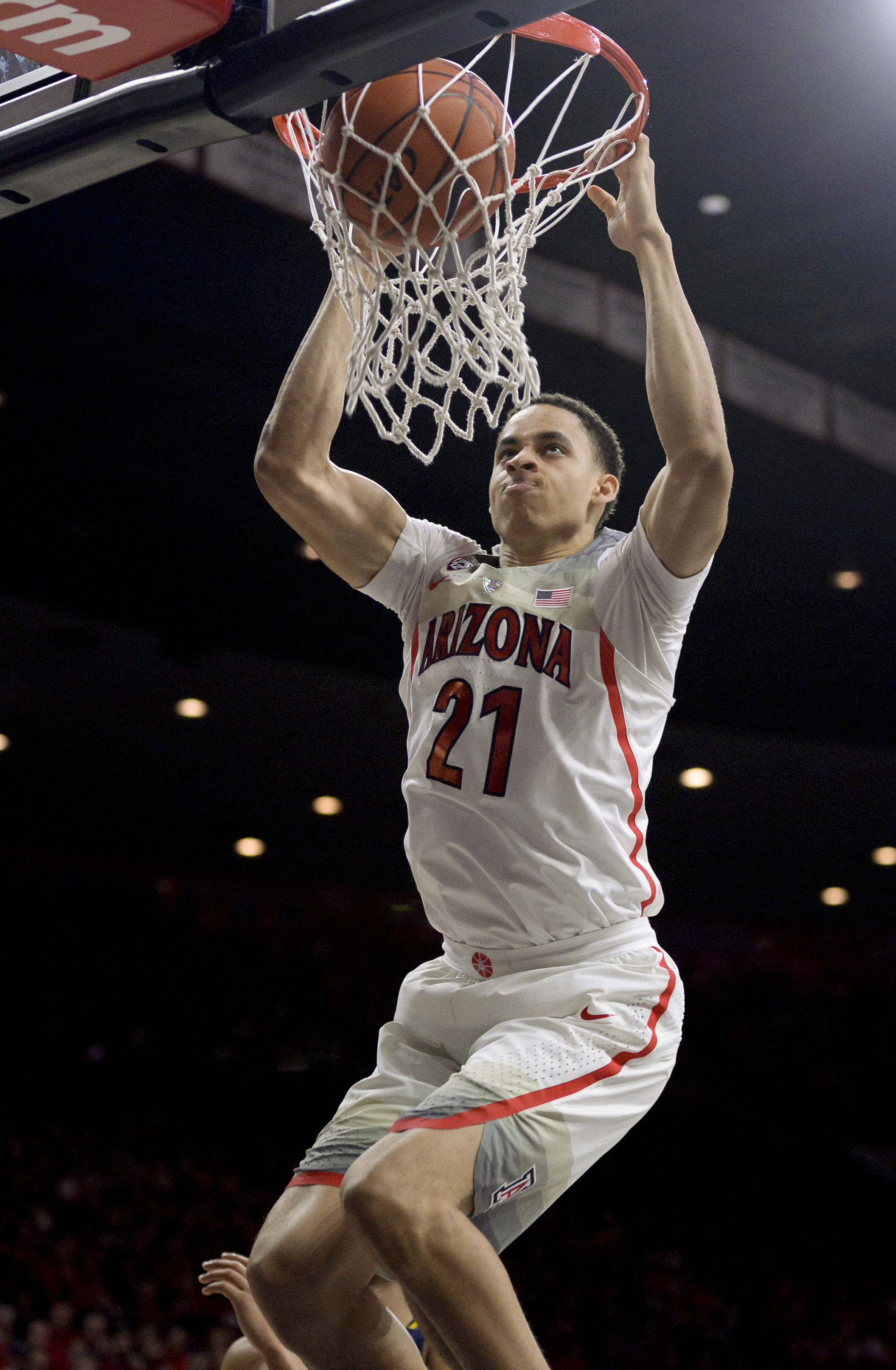 Feb 11, 2017; Tucson, AZ, USA; Arizona Wildcats center Chance Comanche (21) dunks the ball during the second half against the California Golden Bears at McKale Center. Arizona won 62-57. Mandatory Credit: Casey Sapio-USA TODAY Sports