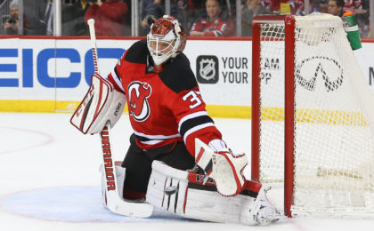 Feb 12, 2017; Newark, NJ, USA; New Jersey Devils goalie Cory Schneider (35) defends his net during the first period of their game against the San Jose Sharks at Prudential Center. Mandatory Credit: Ed Mulholland-USA TODAY Sports