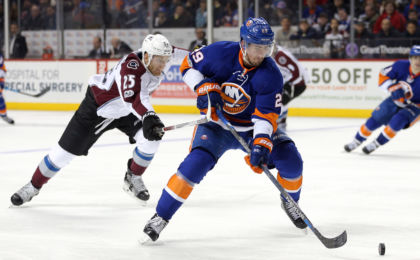 Feb 12, 2017; Brooklyn, NY, USA; New York Islanders center Brock Nelson (29) controls the puck against Colorado Avalanche center Mikhail Grigorenko (25) during the second period at Barclays Center. Mandatory Credit: Brad Penner-USA TODAY Sports