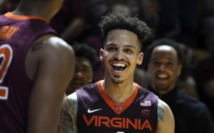 Feb 12, 2017; Blacksburg, VA, USA; Virginia Tech Hokies guard Seth Allen (4) reacts following a made basket against the Virginia Cavaliers at Cassell Coliseum. Mandatory Credit: Michael Shroyer-USA TODAY Sports