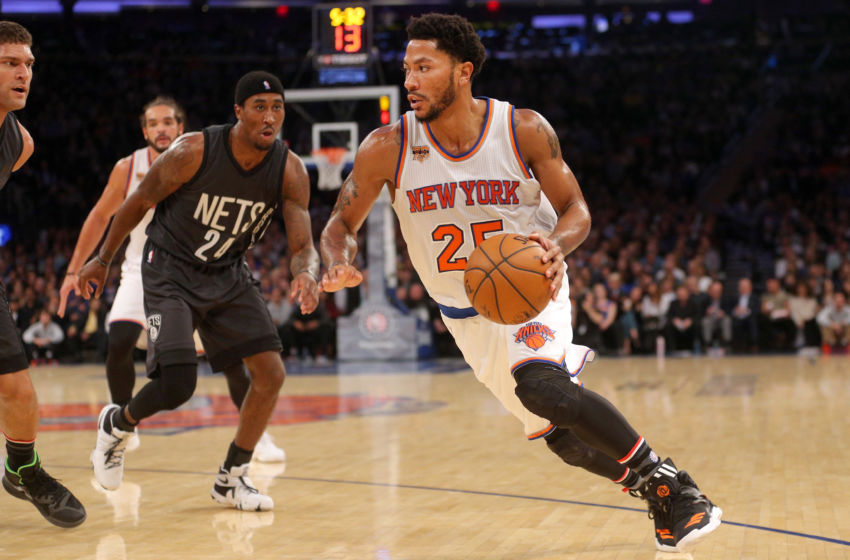 Nov 9, 2016; New York, NY, USA; New York Knicks point guard Derrick Rose (25) drives against Brooklyn Nets shooting guard Rondae Hollis-Jefferson (24) during the third quarter at Madison Square Garden. Mandatory Credit: Brad Penner-USA TODAY Sports