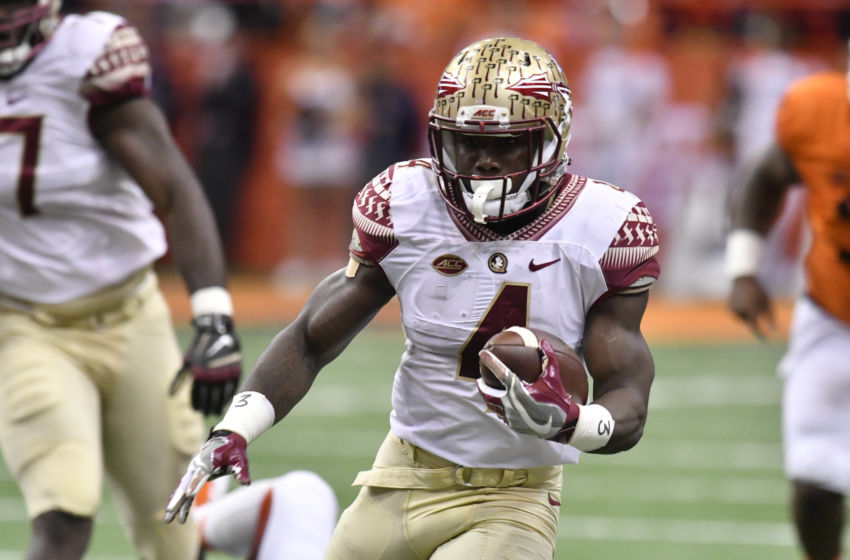 Nov 19, 2016; Syracuse, NY, USA; Florida State Seminoles running back Dalvin Cook (4) carries the ball during the first quarter of a game against the Syracuse Orange at the Carrier Dome. Mandatory Credit: Mark Konezny-USA TODAY Sports