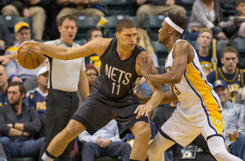 Jan 5, 2017; Indianapolis, IN, USA; Brooklyn Nets center Brook Lopez (11) dribbles in on Indiana Pacers center Myles Turner (33) in the first half of the game at Bankers Life Fieldhouse. The Indiana Pacers beat the Brooklyn Nets 121-109. Mandatory Credit: Trevor Ruszkowski-USA TODAY Sports