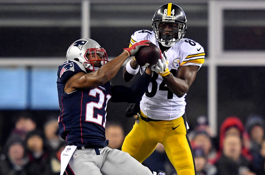 Jan 22, 2017; Foxborough, MA, USA; New England Patriots cornerback Malcolm Butler (21) breaks up a pass intended for Pittsburgh Steelers tight end David Johnson (82) during the first quarter in the 2017 AFC Championship Game at Gillette Stadium. Mandatory Credit: James Lang-USA TODAY Sports