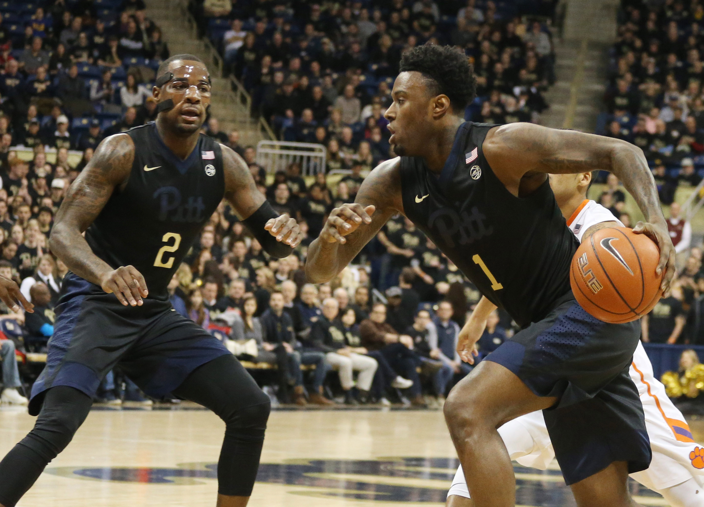Jan 28, 2017; Pittsburgh, PA, USA; Pittsburgh Panthers forward Jamel Artis (1) dribbles to the basket against the Clemson Tigers during the first half at the Petersen Events Center. Mandatory Credit: Charles LeClaire-USA TODAY Sports