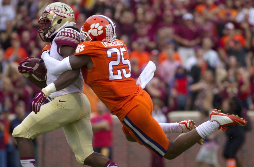 Nov 7, 2015; Clemson, SC, USA; Clemson Tigers cornerback Cordrea Tankersley (25) attempts to bring down Florida State Seminoles running back Dalvin Cook (4) during the first quarter at Clemson Memorial Stadium. Mandatory Credit: Joshua S. Kelly-USA TODAY Sports