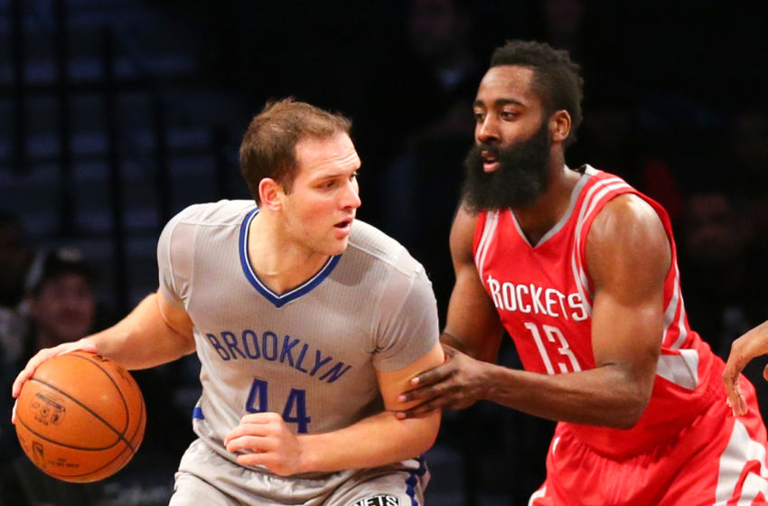 Dec 8, 2015; Brooklyn, NY, USA; Houston Rockets guard James Harden (13) defends Brooklyn Nets guard Bojan Bogdanovic (44) during the first quarter at Barclays Center. Mandatory Credit: Anthony Gruppuso-USA TODAY Sports