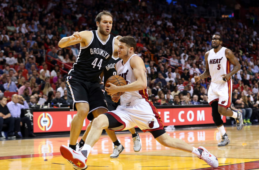 Dec 28, 2015; Miami, FL, USA; Miami Heat guard Tyler Johnson (8) drives to the basket as Brooklyn Nets guard Bojan Bogdanovic (44) defends during the second half at American Airlines Arena. Mandatory Credit: Steve Mitchell-USA TODAY Sports