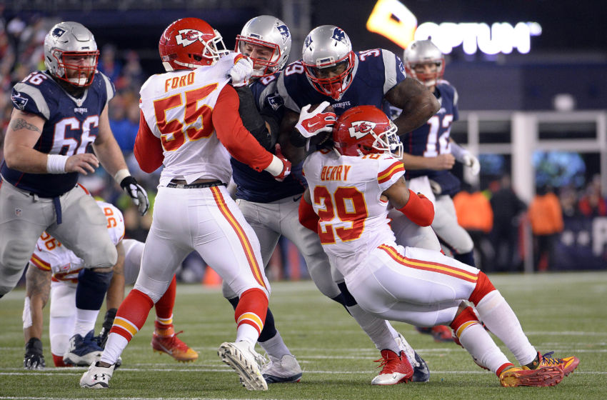 Jan 16, 2016; Foxborough, MA, USA; New England Patriots running back Steven Jackson (39) runs the ball against Kansas City Chiefs free safety Eric Berry (29) during the third quarter in the AFC Divisional round playoff game at Gillette Stadium. Mandatory Credit: Robert Deutsch-USA TODAY Sports
