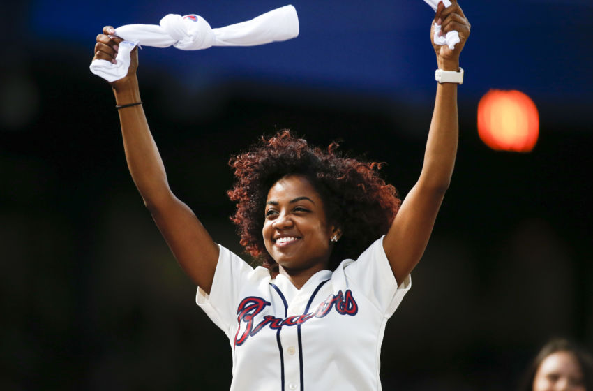 Jul 16, 2016; Atlanta, GA, USA; Atlanta Braves Tomahawk Team member stands on the dugout against the Colorado Rockies in the seventh inning at Turner Field. Mandatory Credit: Brett Davis-USA TODAY Sports