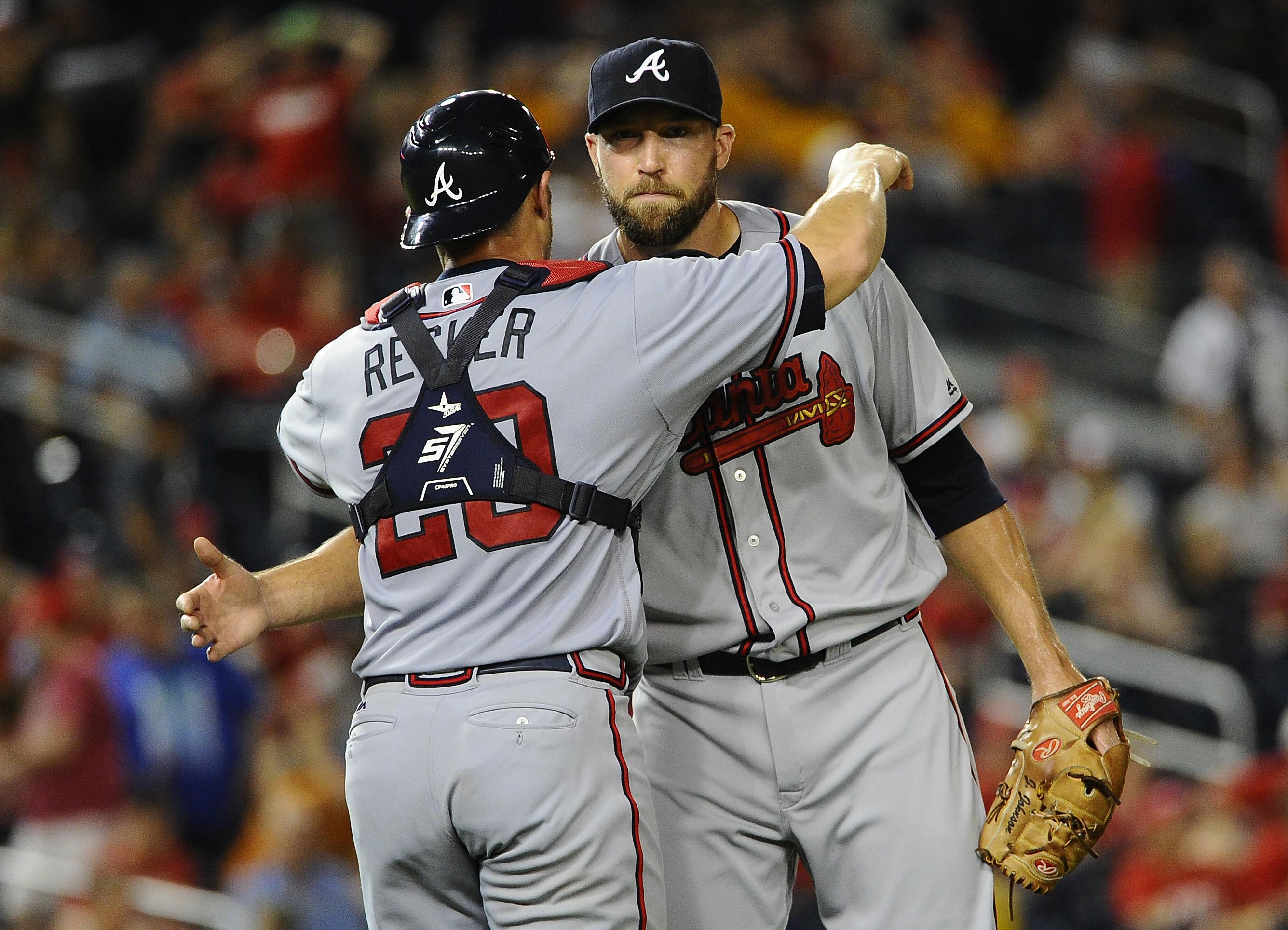 Aug 12, 2016; Washington, DC, USA; Atlanta Braves relief pitcher Jim Johnson (53) is congratulated by catcher Anthony Recker (20) after earning a save against the Washington Nationals at Nationals Park. Mandatory Credit: Brad Mills-USA TODAY Sports