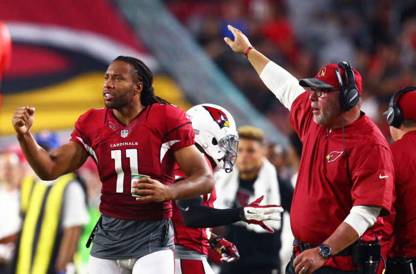 Aug 12, 2016; Glendale, AZ, USA; Arizona Cardinals wide receiver Larry Fitzgerald (11) and head coach Bruce Arians against the Oakland Raiders during a preseason game at University of Phoenix Stadium. Mandatory Credit: Mark J. Rebilas-USA TODAY Sports