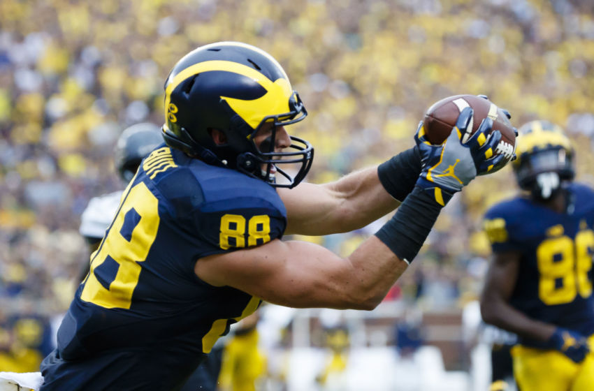 Sep 10, 2016; Ann Arbor, MI, USA; Michigan Wolverines tight end Jake Butt (88) makes a reception for a touchdown in the second quarter against the UCF Knights at Michigan Stadium. Mandatory Credit: Rick Osentoski-USA TODAY Sports