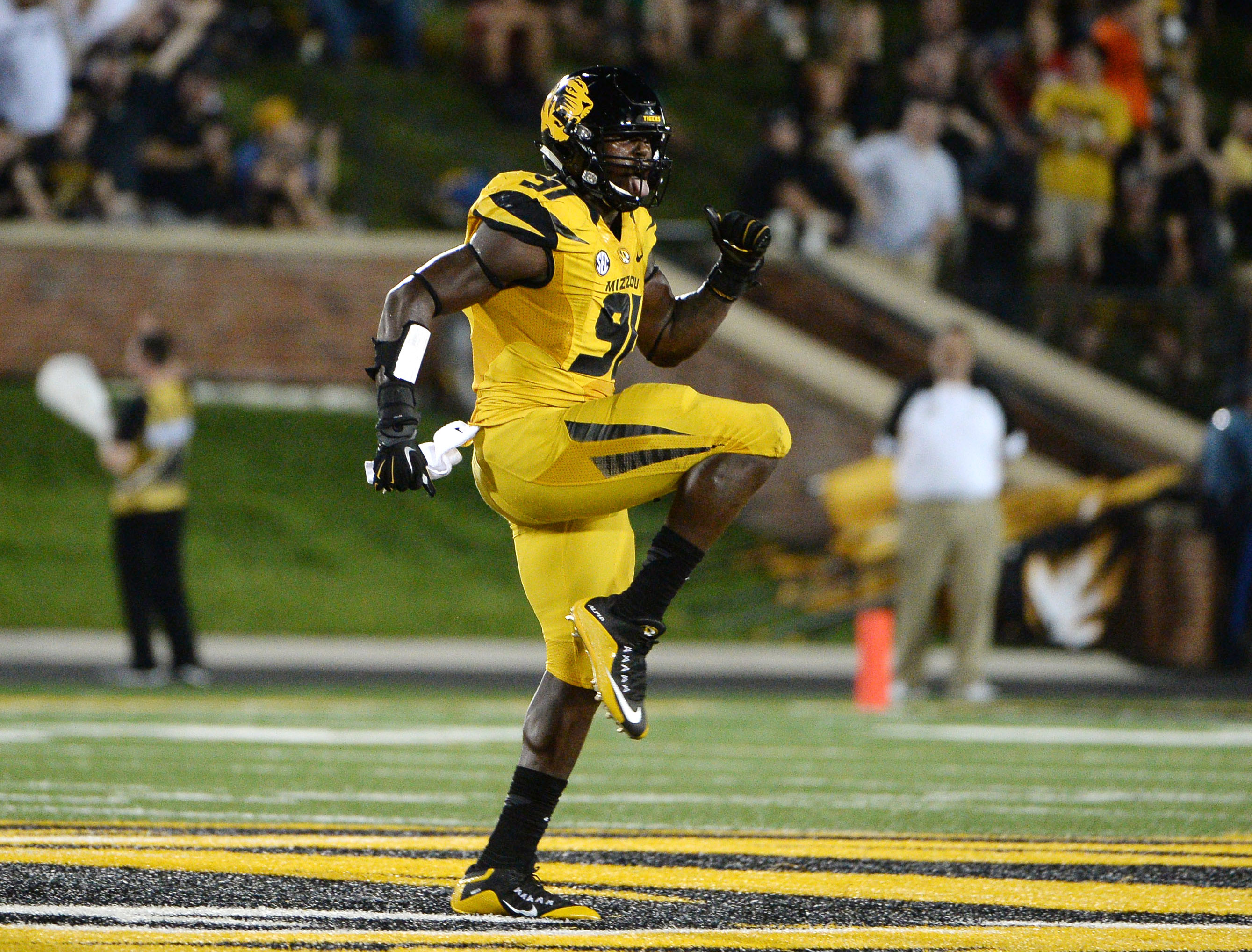 Sep 17, 2016; Columbia, MO, USA; Missouri Tigers defensive end Charles Harris (91) celebrates after a sack against the Georgia Bulldogs in the first half at Faurot Field. Mandatory Credit: John Rieger-USA TODAY Sports