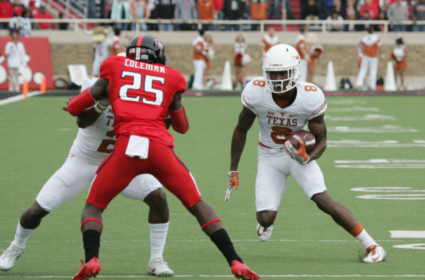 Nov 5, 2016; Lubbock, TX, USA; University of Texas Longhorns wide receiver Dorian Leonard (8) looks for an opening against Texas Tech Red Raiders defensive back Douglas Coleman (25) in the first half at Jones AT&T Stadium. Mandatory Credit: Michael C. Johnson-USA TODAY Sports