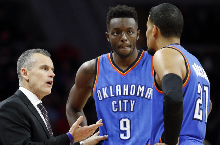 Nov 14, 2016; Auburn Hills, MI, USA; Oklahoma City Thunder head coach Billy Donovan talks with Oklahoma City Thunder forward Jerami Grant (9) and guard Andre Roberson (21) during the second quarter against the Detroit Pistons at The Palace of Auburn Hills. Mandatory Credit: Raj Mehta-USA TODAY Sports