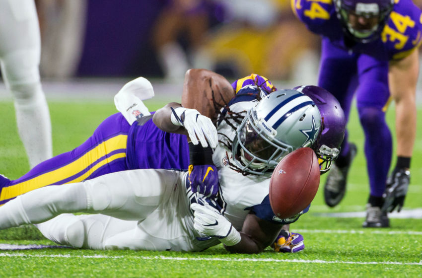 Dec 1, 2016; Minneapolis, MN, USA; Minnesota Vikings defensive lineman Everson Griffen (97) tackles Dallas Cowboys wide receiver Lucky Whitehead (13) for a fumble in the second quarter at U.S. Bank Stadium. Mandatory Credit: Brad Rempel-USA TODAY Sports