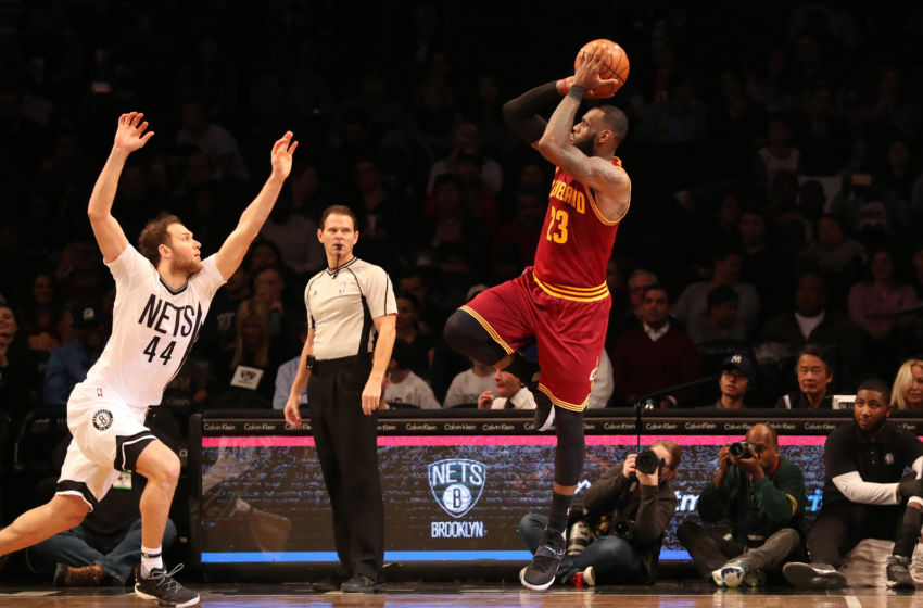 Jan 6, 2017; Brooklyn, NY, USA; Cleveland Cavaliers forward LeBron James (23) shoots over Brooklyn Nets guard Bojan Bogdanovic (44) during the third quarter at Barclays Center. Cleveland Cavaliers won 116-108. Mandatory Credit: Anthony Gruppuso-USA TODAY Sports