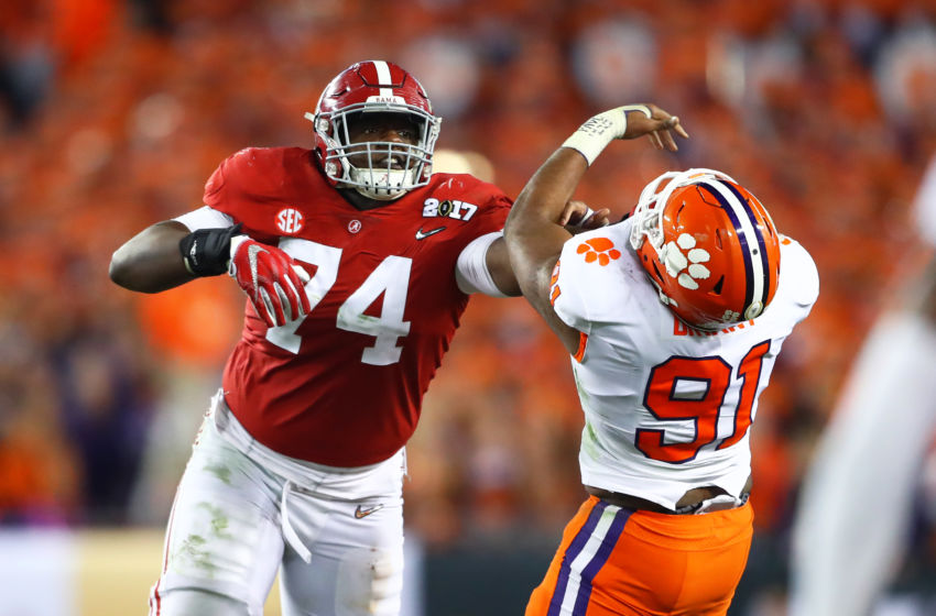 Jan 9, 2017; Tampa, FL, USA; Alabama Crimson Tide offensive lineman Cam Robinson (74) against Clemson Tigers defensive end Austin Bryant (91) in the 2017 College Football Playoff National Championship Game at Raymond James Stadium. Mandatory Credit: Mark J. Rebilas-USA TODAY Sports