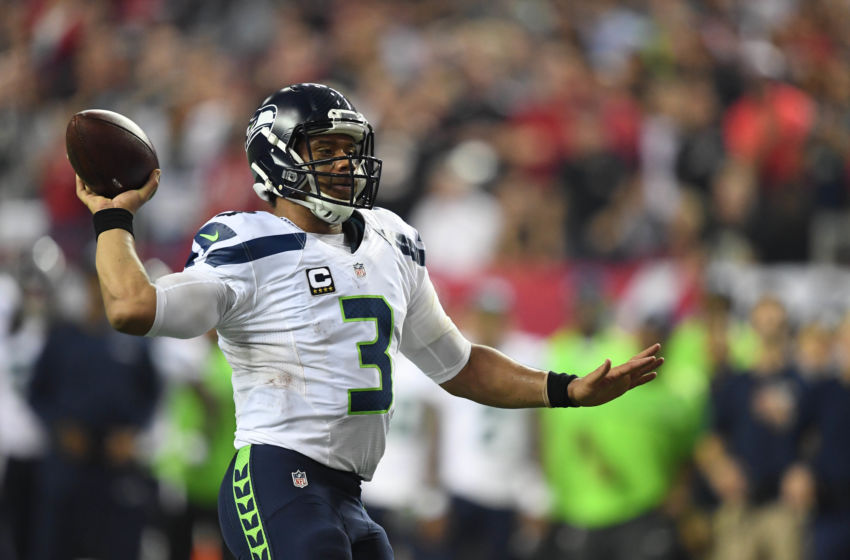 Jan 14, 2017; Atlanta, GA, USA; Seattle Seahawks quarterback Russell Wilson (3) throws against the Atlanta Falcons during the third quarter in the NFC Divisional playoff at Georgia Dome. Mandatory Credit: John David Mercer-USA TODAY Sports