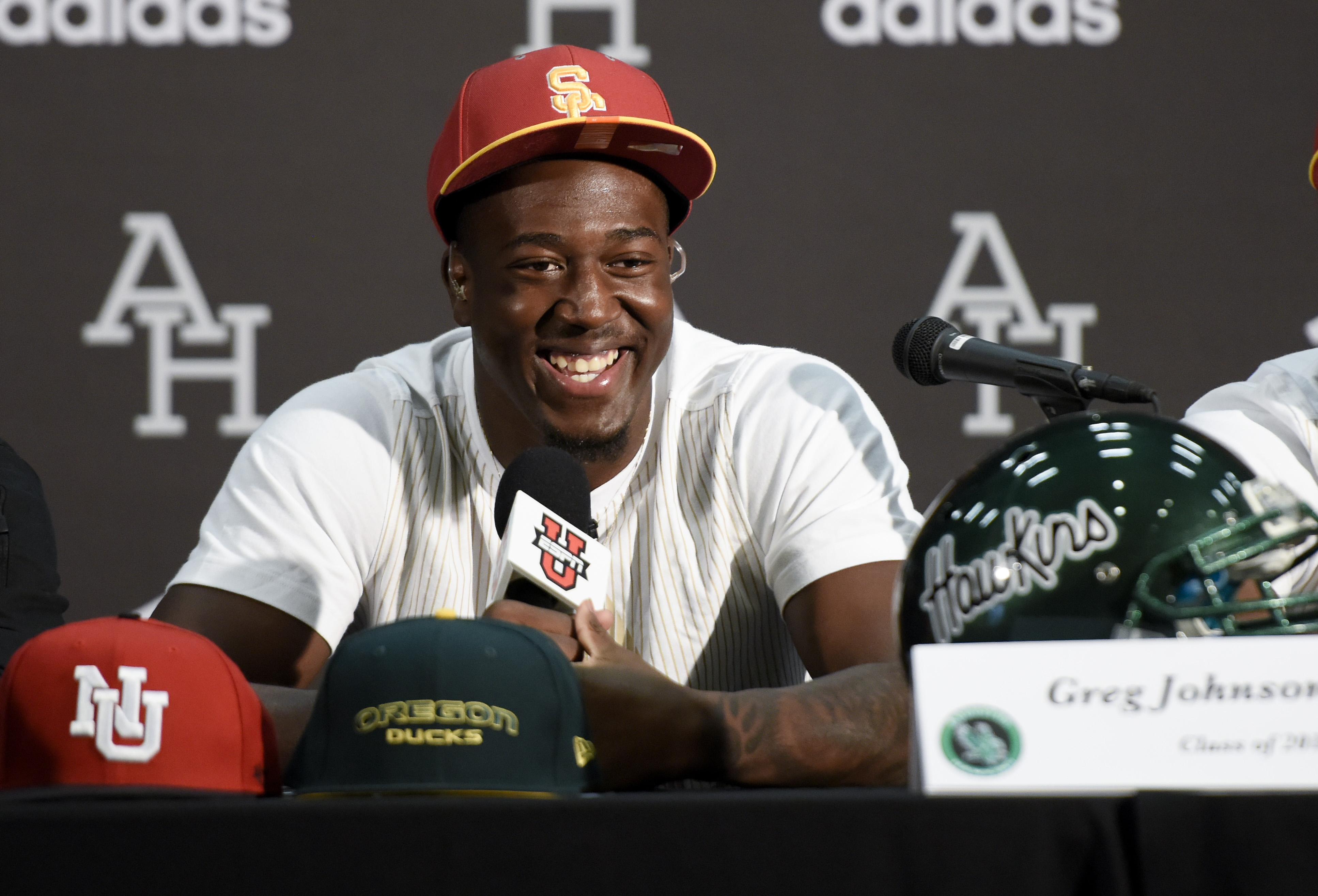 Feb 1, 2017; Los Angeles, CA, USA; Greg Johnson announces that he will sign with USC at Augustus Hawkins High School. Mandatory Credit: Kelvin Kuo-USA TODAY Sports