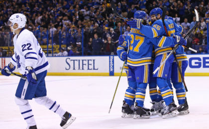 Feb 2, 2017; St. Louis, MO, USA; St. Louis Blues defenseman Colton Parayko (55) celebrates with teammates after scoring a goal against the Toronto Maple Leafs as defenseman Nikita Zaitsev (22) skates away during the second period at Scottrade Center. Mandatory Credit: Billy Hurst-USA TODAY Sports