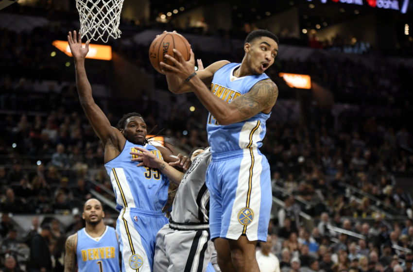Feb 4, 2017; San Antonio, TX, USA; Denver Nuggets guard Gary Harris (14) grabs a rebound against the San Antonio Spurs during the first half at the AT&T Center. Mandatory Credit: Brendan Maloney-USA TODAY Sports