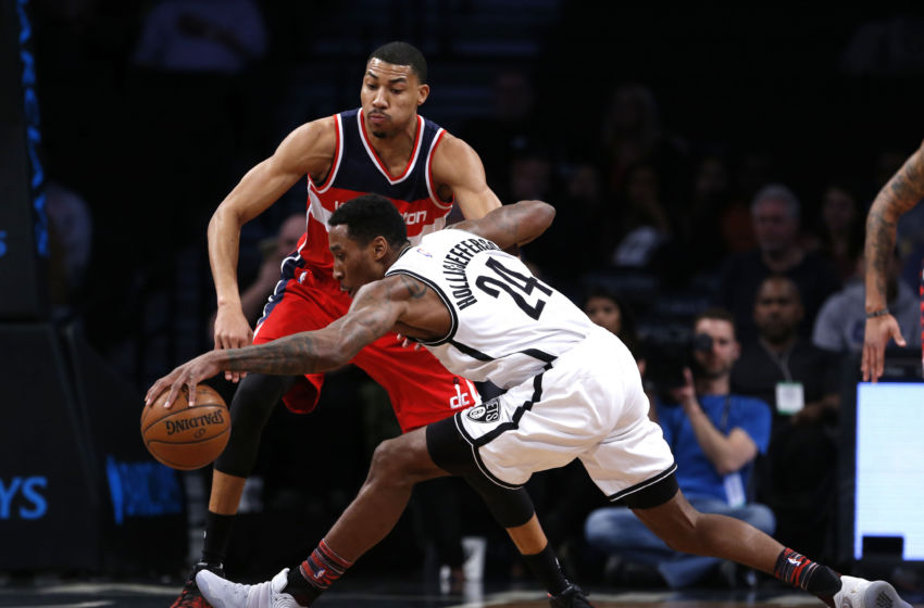 Feb 8, 2017; Brooklyn, NY, USA; Washington Wizards forward Otto Porter Jr. (22) defends against Brooklyn Nets forward Rondae Hollis-Jefferson (24) during first half at Barclays Center. Mandatory Credit: Noah K. Murray-USA TODAY Sports