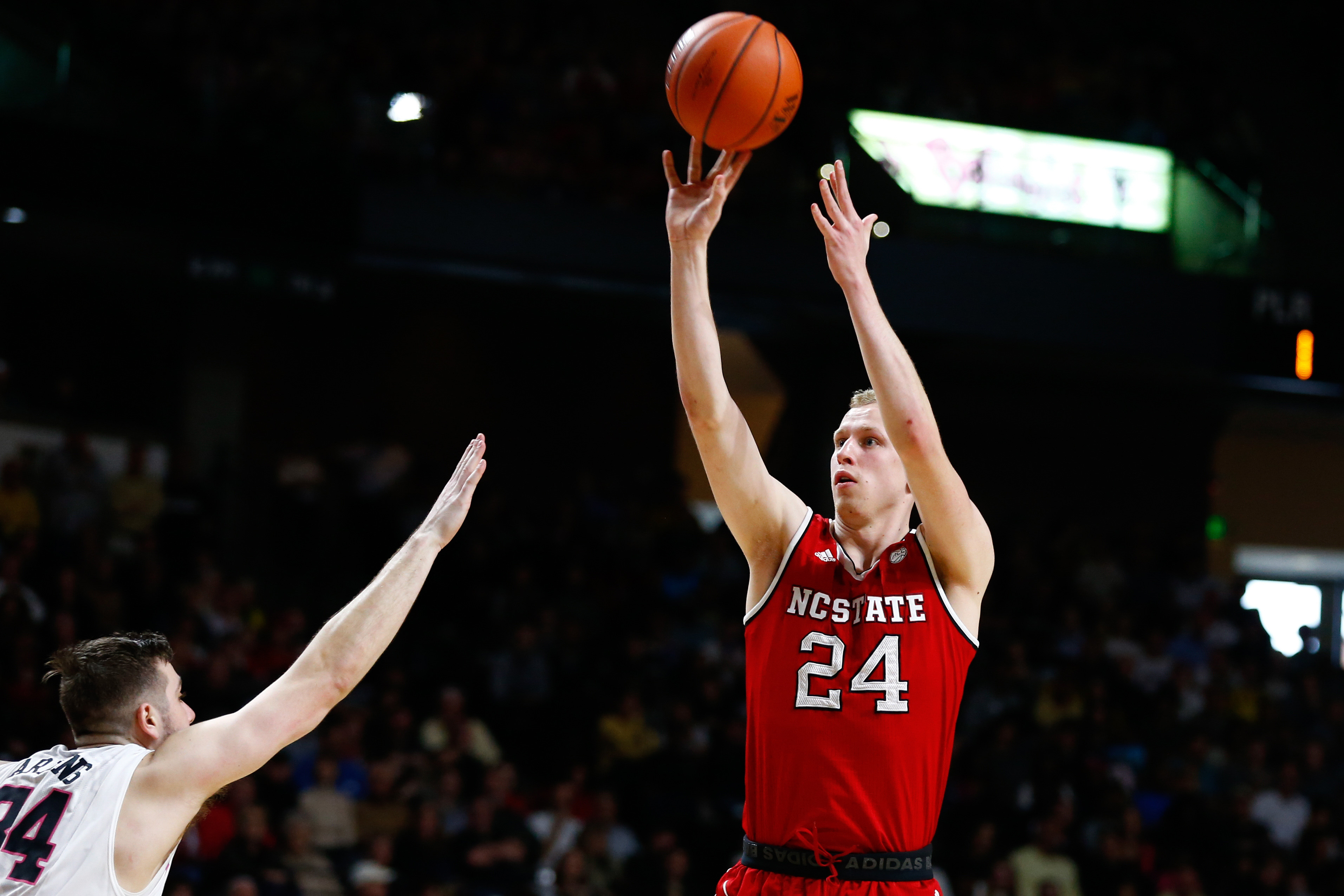 Feb 11, 2017; Winston-Salem, NC, USA; North Carolina State Wolfpack guard Maverick Rowan (24) shoots the ball against the Wake Forest Demon Deacons during the second half at Lawrence Joel Veterans Memorial Coliseum. The Demon Deacons won 88-58. Mandatory Credit: Jeremy Brevard-USA TODAY Sports