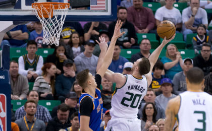 Mar 22, 2017; Salt Lake City, UT, USA; Utah Jazz forward Gordon Hayward (20) shoots the ball against New York Knicks forward Kristaps Porzingis (6) during the first quarter at Vivint Smart Home Arena. Mandatory Credit: Russ Isabella-USA TODAY Sports