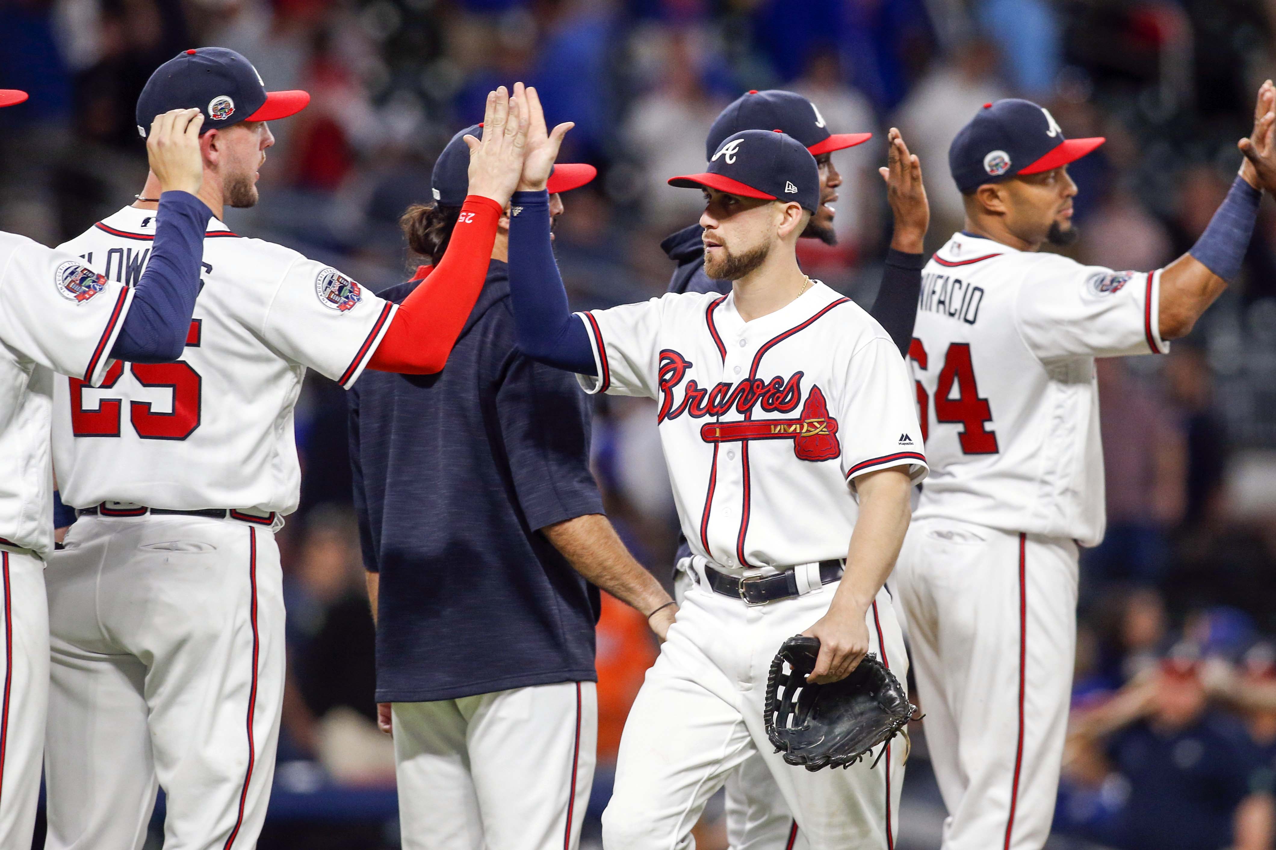 Atlanta Braves fend off comeback attempt, best Harvey in win