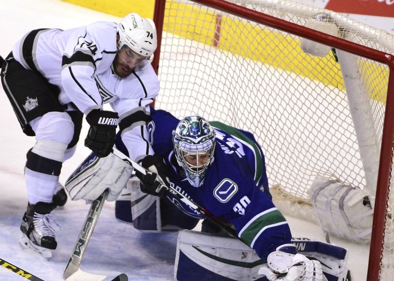 Apr 4, 2016; Vancouver, British Columbia, CAN; Vancouver Canucks goaltender Ryan Miller (30) defends against Los Angeles Kings forward <a rel=