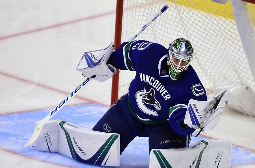 Oct 3, 2016; Vancouver, British Columbia, CAN; Vancouver Canucks goaltender Jacob Markstrom (25) makes a save against a shot by the Arizona Coyotes during the third period during a preseason hockey game at Rogers Arena. The Arizona Coyotes won 4-2. Mandatory Credit: Anne-Marie Sorvin-USA TODAY Sports