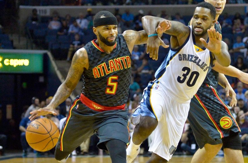 Oct 6, 2016; Memphis, TN, USA; Atlanta Hawks guard Malcolm Delaney (5) dribbles the ball as Memphis Grizzlies guard <a rel=